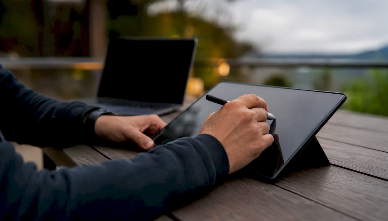Hands editing digital content templates